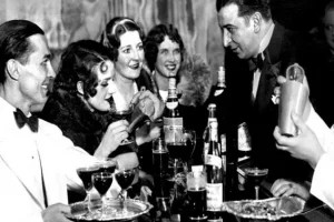 Men and women at a Prohibition-era Speakeasy.